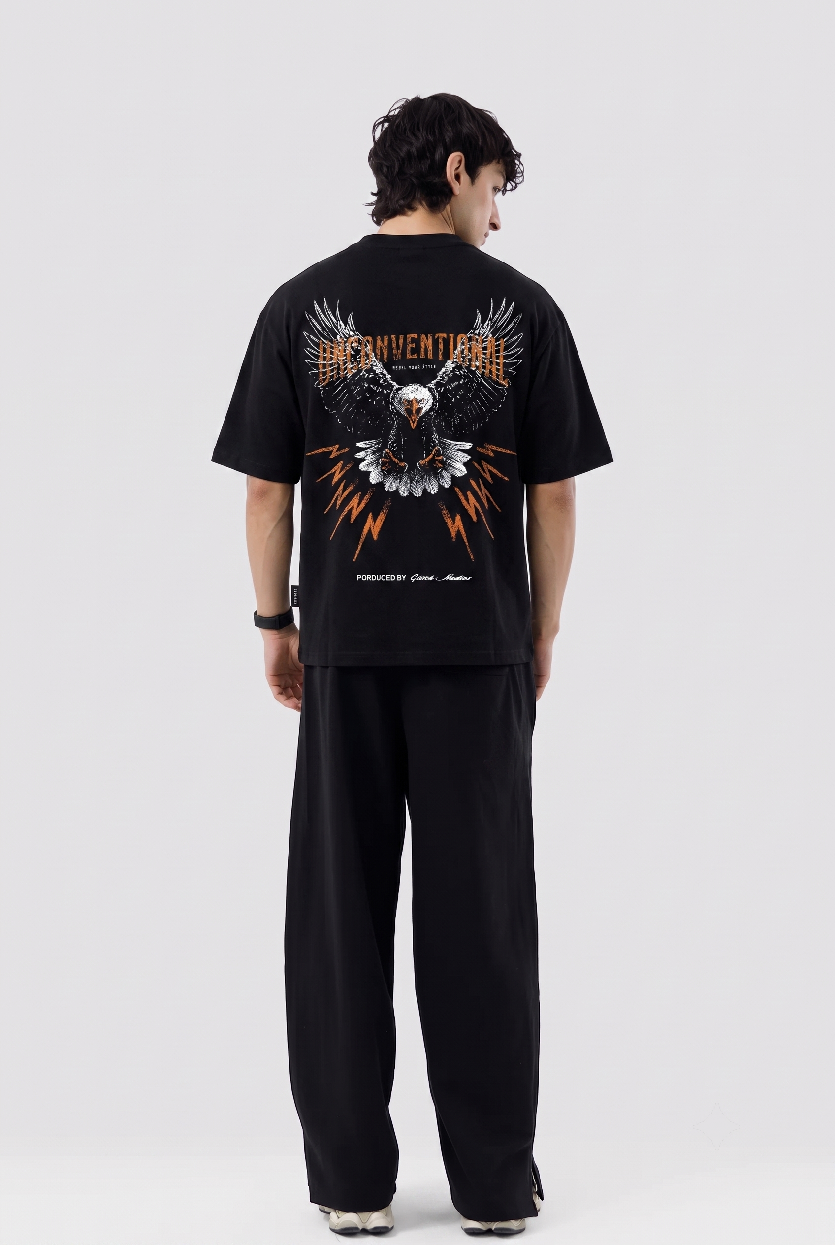 'UNCONVENTIONAL' Graphic Oversized Tee